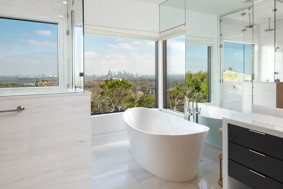 Bathroom mirror and glass with a valley view