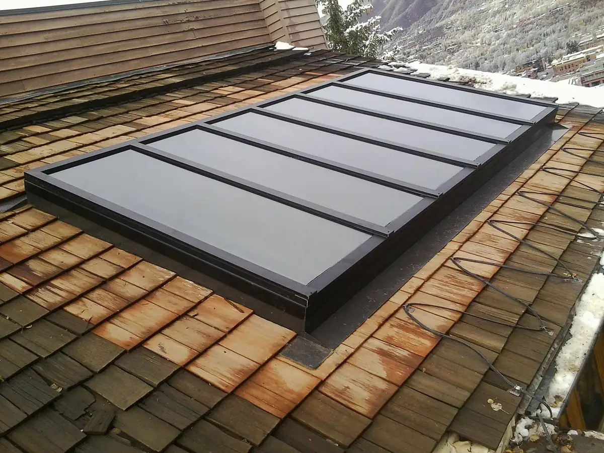 Multi-lite skylight assembly installed in a tile roof