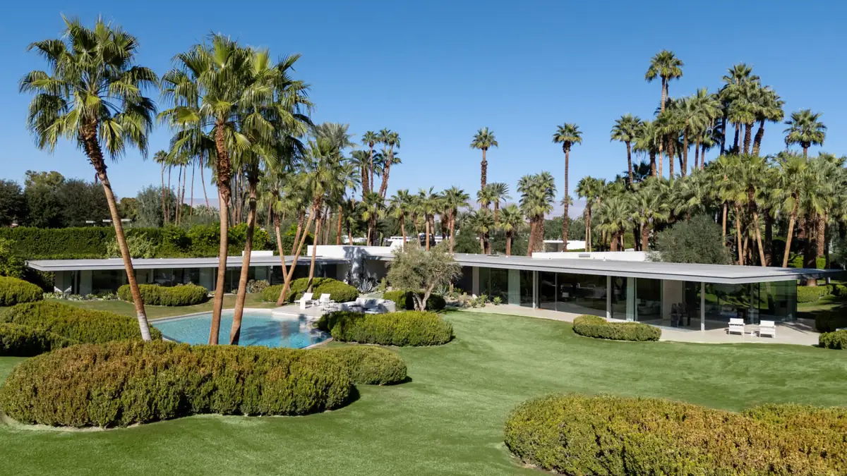 Mid-century desert estate with a continuous window wall
